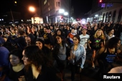 Protesters against president-elect Donald Trump march peacefully through Oakland, California, Nov. 9, 2016.