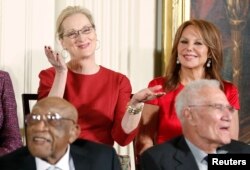 Medal of Freedom recipients include, clockwise from upper left, actresses Meryl Streep and Marlo Thomas, economist Robert Solow and golfer Charles Sifford.