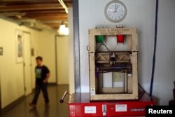 A 3-D printer is pictured at TechShop in the South of Market neighborhood in San Francisco, California, April 24, 2014.