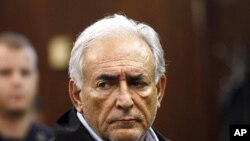 International Monetary Fund (IMF) chief Dominique Strauss-Kahn appears in Manhattan Criminal Court during his arraignment in New York May 16, 2011.