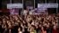 FILE - Supporters attend the last campaign rally of the coalition Unidos Podemos (Together We Can) for Spain's upcoming general election in Madrid, Spain, June 24, 2016. 