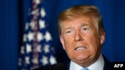 In this Jan. 3, 2020, photo, President Donald Trump makes a statement on Iran at the Mar-a-Lago estate in Palm Beach Florida.