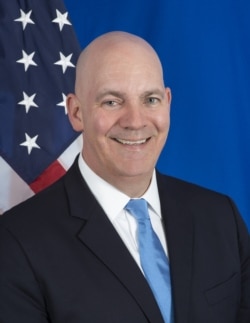 R. Clarke Cooper, Assistant Secretary of State for Political-Military Affairs, is seen in an official State Department photo.