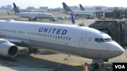 FILE - United Airlines will cease flights to Lagos, Nigeria's largest city, in June. 