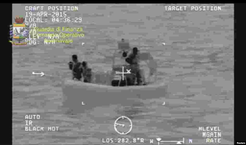 A rescue vessel is seen during the search and rescue operation under way after a boat carrying migrants capsized overnight, with up to 700 feared dead, in this still image taken from video released by Italian Guardia di Finanza, April 19, 2015.