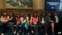 Invited students from Yuma and Pueblo, Colorado, listen to a Colorado Legislature debate on a bill which would grant in-state tuition to undocumented students, inside the State Capitol, in Denver, March 5, 2013.