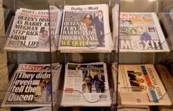 FILE - Newspapers are seen for sale in London, Jan. 9, 2020.