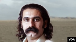 Undated photo of Reza Yavari, an Iranian Gonabadi Dervish activist who was arrested in Tehran in February 2018, released from a prison in Ahvaz upon receiving a pardon in April 2020, and later forced into internal exile. (VOA Persian)