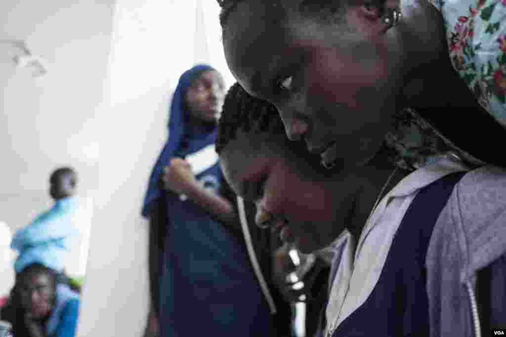 Seynabu Ndiaye and Awa Gaye test their robot at the 2017 Pan-African Robotics Competition in Dakar, Senegal, May 19, 2017. (R. Shryock/VOA)