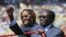 Zimbabwe President Robert Mugabe and his wife Grace arrive for his inauguration as President, in Harare, August 22, 2013. 