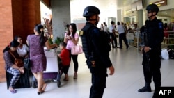 Indonesian Special Police patrol at Ngurah Rai Airport in Denpasar on Indonesia's resort island of Bali on Jan. 15, 2016, one day after a series of explosions hit the Indonesian capital Jakarta. 