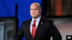 FILE - Then-Iowa Republican senatorial candidate and former U.S. Attorney Matt Whitaker is pictured before a televised debate in Johnston, Iowa, April 24, 2014. 