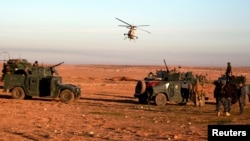 Iraqi security forces advance toward the western side of Mosul, Iraq Feb. 19, 2017.