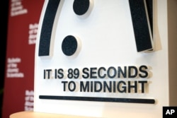 The Doomsday Clock of the Bulletin of the Atomic Scientists, set at 89 seconds to midnight, is displayed during a news conference at the United States Institute of Peace, Jan. 28, 2025, in Washington.