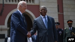 U.S. President Joe Biden shakes hands with Angolan President Joao Lourenco ahead of their meeting at the Presidential Palace in Luanda on Dec. 3, 2024.