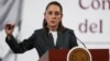 FILE - Mexico's President Claudia Sheinbaum holds a press conference at the National Palace in Mexico City a day before the imposition of tariffs by U.S. President Donald Trump, March 3, 2025.