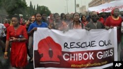Women attend a demonstration calling on the government to rescue kidnapped schoolgirls, Abuja, Nigeria, April, 30. 2014.