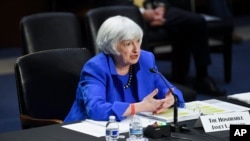 U.S. Treasury Secretary Janet Yellen, seen here during testimony on Capitol Hill, has warned that the government could run out of cash by October 18 if the debt ceiling is not raised or suspended, leading to its first-ever default. 