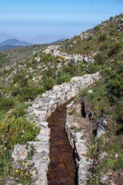 A diversion canal as part of the pre-Inca infiltration system during the wet season. Canals like this divert water during the wet season to zones of high permeability. (M. Briceño, CONDESAN, 2012)