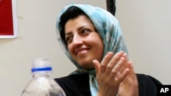 FILE - Prominent Iranian human rights activist Narges Mohammadi is seen in a meeting on women's rights in Tehran, Iran, on July 3, 2008.