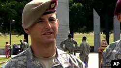 In this image from video provided by the U.S. Army, then-Sgt. 1st Class Thomas Payne is interviewed as a winner of the 2012 Best Ranger competition at Fort Benning, Ga., on April 16, 2012. 