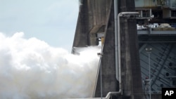 An AR-22 rocket engine is test fired at the NASA Stennis Space Center in Stennis, Miss., July 2, 2018. The AR-22 engine is designed to power an experimental spacecraft. 