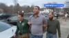 This image taken from video provided by Newsnation/TMX shows reporter Evan Lambert being taken into police custody on Wednesday, Feb. 8, 2023 in East Palestine, Ohio. (NewsNation TMX via AP)