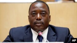 FILE - Democratic Republic Congo's President Joseph Kabila attends a meeting at the African Union Headquarters in Addis Ababa, Ethiopia, Feb. 24, 2013. Talks started Dec. 13, 2016, to decide who will run the country after Kabila's second term ends Dec. 19, 2016.