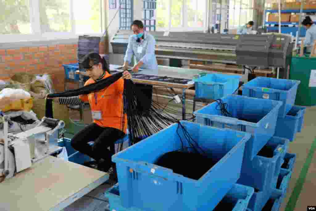 The factory is SA8000 certified -- the highest standard in social compliance, a rarity for a company in Cambodia. (S. Herman/VOA)