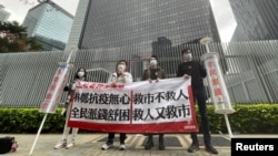 香港2021年2月公佈財政預算，示威者指政治過度干預下民生受打擊（路透社照片）