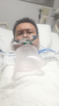 Yvan Osorio, a photojournalist from Venezuela and a friend of Celia Mendoza, sent her this photo from his hospital bed, where he died after weeks of battling the coronavirus on May 1st.