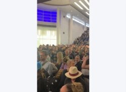 This handout UGC image obtained March 15, 2020, courtesy of Joe Rosengarten shows a crowded O'Hare International airport in Chicago, Illinois, March 14, 2020.