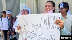 Cambodian environment activists react after a Cambodian court delivered verdict against activists from the environmental group Mother Nature Cambodia on charges of plotting against the government and insulting the King, in Phnom Penh, on July 2, 2024. (Chantha Lach/Reuters)