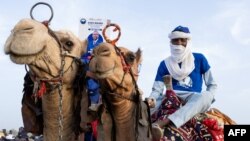Supporters of Chad's transitional prime minister and Les Transformateurs party presidential candidate Succes Masra attend his final election campaign rally at the N'Djamena racecourse, Chad, on May 4, 2024.