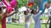 A workshop on fan dancing at the Smithsonian Folklife Festival in Washington, June 25, 2014. (Regina Catipon/VOA