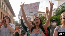 অস্টিনে টেক্সাস বিশ্ববিদ্যালয়ে ফিলিস্তিনের সমর্থনে শিক্ষার্থীদের বিক্ষোভ। ফটোঃ ২৪ এপ্রিল, ২০২৪। 