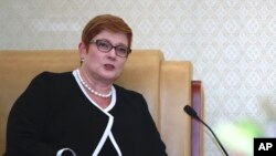 FILE - Australian Foreign Minister Marise Payne speaks during a meeting June 12, 2019. Payne said Thursday she doesn't think the arrests of Australian and Australian-British nationals are related.