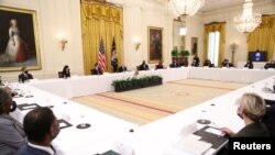 U.S. President Joe Biden holds first Cabinet meeting at the White House in Washington, U.S., April 1, 2021. REUTERS/Tom Brenner