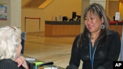 Leah Esguerra (right) is a full-time social worker assigned to work with the homeless who frequent the San Francisco Public Library.