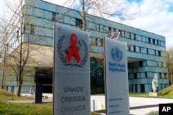 FILE - The headquarters of the World Health Organization in Geneva, Switzerland.