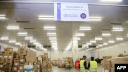Boxes containing mostly personal protective equipment (PPE), are seen at Ethiopian Airlines' cargo facility at Bole International Airport in Addis Ababa, Ethiopia, April 14, 2020. 