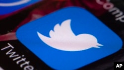 FILE - The Twitter app is seen on a smartphone in Philadelphia, Pennsylvania, April 26, 2017.