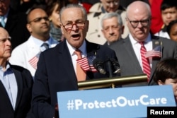 FILE - Senate Minority Leader Chuck Schumer speaks at an event marking the seventh anniversary of the passing of the Affordable Care Act outside the Capitol Building in Washington, March 22, 2017.