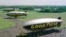 In this June 18, 1998 file photo, three Goodyear blimps, the then newly commissioned Stars and Stripes, foreground, the decommissioned Stars and Stripes, middle, and the Spirit of Akron are moored at the Goodyear blimp base in Suffield, Ohio. (AP Photo/Jeff Glidden)