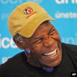 UNICEF Ambassador and actor Danny Glover laughs during an event in Lima October 20, 2010 (file photo)