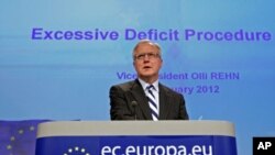 European Economic and Monetary Affairs Commissioner Olli Rehn addresses a news conference at the EU Commission headquarters in Brussels, January 11, 2012.