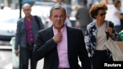 FILE - French conservative Les Republicains (LR) party member Thierry Mariani arrives at their political party headquarters in Paris, July 11, 2017.