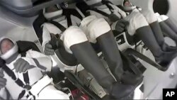 This image from video provided by SpaceX shows passengers aboard SpaceX’s first private flight as it blasts off Sept. 15, 2021, from Kennedy Space Center at Cape Canaveral, Fla. 