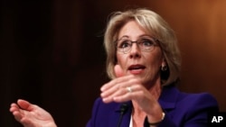 Education secretary-designate Betsy DeVos testifies on Capitol Hill in Washington, Jan. 17, 2017, at her confirmation hearing before the Senate Health, Education, Labor and Pensions Committee.