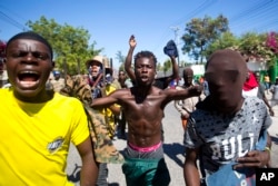 Protesters chant anti-government slogans demanding the resignation of President Jovenel Moise in Port-au-Prince, Haiti, Feb. 11, 2019.